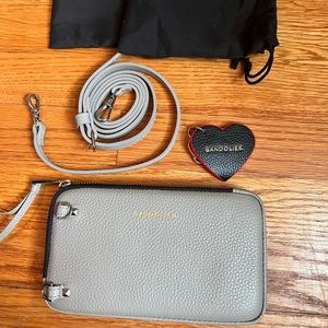 Bandolier cell phone cross body carrier